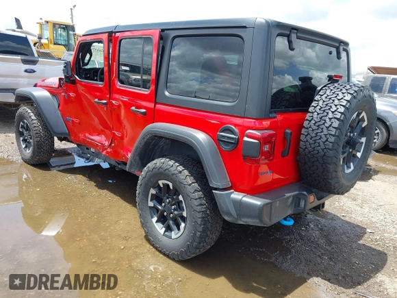 2024 Jeep Wrangler Rubicon with VIN 1C4RJXR60RW292120, listed as a IAAI auction lot 42613719 with 31,286 mi miles and . Bid and sale history available at DreamBid. Image 3.