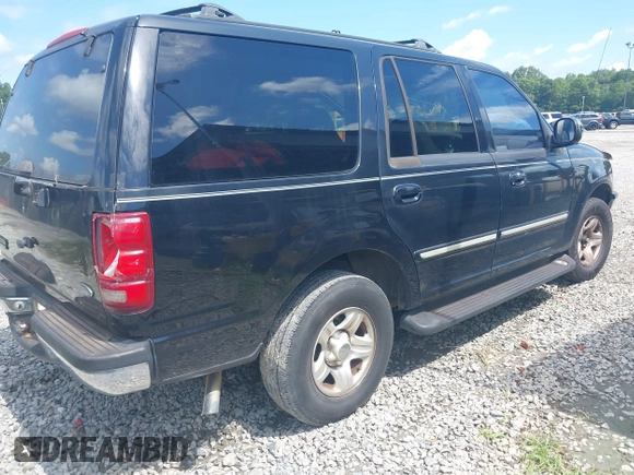 1998 Ford Expedition XLT with VIN 1FMRU176XWLB30950, listed as a IAAI auction lot 42704595 with 303,838 mi miles and . Bid and sale history available at DreamBid. Image 4.