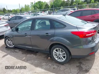 2018 Ford Focus SE with VIN 1FADP3F20JL312395, listed as a IAAI auction lot 42110335 with 110,720 mi miles and . Bid and sale history available at DreamBid. Image 14.