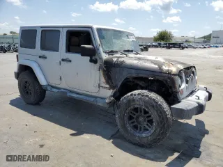 2011 Jeep Wrangler Unlimited Sahara with VIN 1J4BA5H14BL613895, listed as a Copart auction lot 65171404 with 0 mi miles and Non Repairable. Bid and sale history available at carsss.com. Image 4.