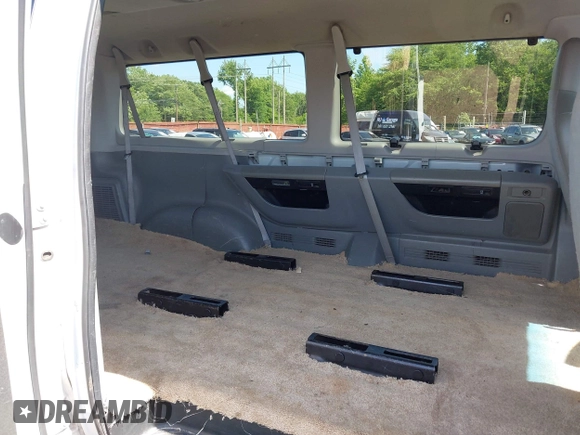 2013 Ford Econoline Passenger XL with VIN 1FBNE3BL6DDA13595, listed as a IAAI auction lot 42570942 with 135,652 mi miles and . Bid and sale history available at DreamBid. Image 8.