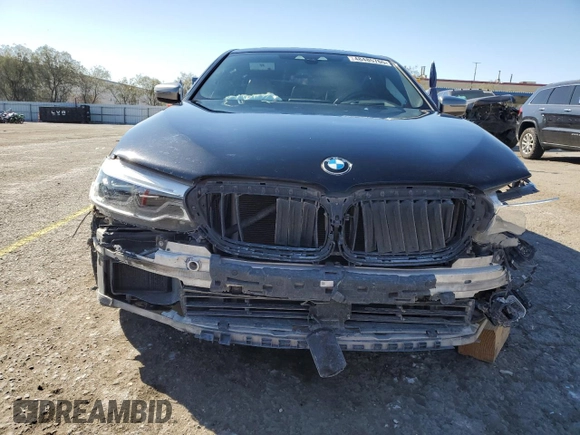 2018 BMW 5 Series M550i xDrive with VIN WBAJB9C55JG463848, listed as a Copart auction lot 48485765 with 47,078 mi miles and Salvage Title. Bid and sale history available at carsss.com. Image 5.