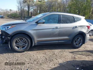 2018 Hyundai Santa Fe 2.4L z VIN 5NMZUDLB7JH077241, wystawiony jako IAAI lot #42135854 z przebiegiem 59 819 mil mil oraz . Historia ofert i sprzedaży dostępna na DreamBid. Obrazek 14.
