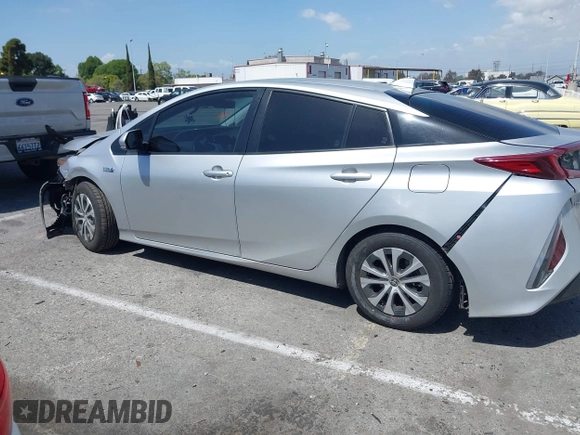 2021 Toyota Prius LE with VIN JTDKAMFP1M3180370, listed as a IAAI auction lot 41928512 with 83,249 mi miles and . Bid and sale history available at DreamBid. Image 15.