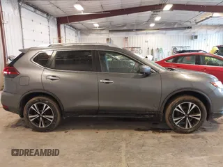 2019 Nissan Rogue SV with VIN JN8AT2MV0KW385450, listed as a IAAI auction lot 41724976 with 75,345 mi miles. Bid and sale history available at carsss.com. Image 13.