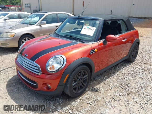 2011 MINI Convertible with VIN WMWZN3C57BTZ89303, listed as a IAAI auction lot 42352242 with 146,448 mi miles and . Bid and sale history available at DreamBid. Image 2.