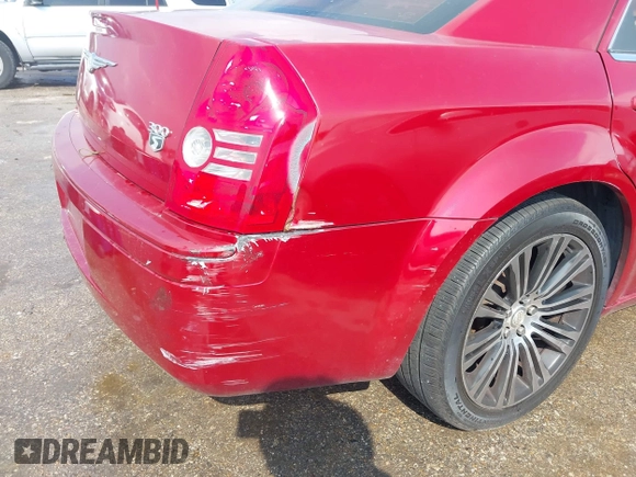 2010 Chrysler 300 with VIN 2C3CA2CV3AH279913, listed as a IAAI auction lot 40731536 with 143,969 mi miles. Bid and sale history available at carsss.com. Image 12.