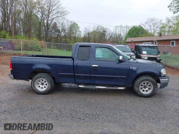 1999 Ford F-150 with VIN 1FTRX17W5XNA06036, listed as a IAAI auction lot 41897561 with 222,979 mi miles and . Bid and sale history available at DreamBid. Image 13.