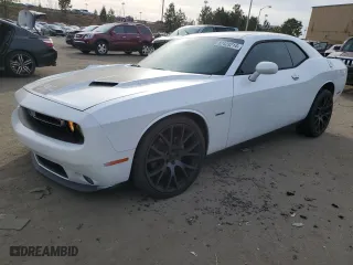 2015 Dodge Challenger R/T with VIN 2C3CDZAT9FH707654, listed as a Copart auction lot 82423214 with 165,880 mi miles and Salvage Title. Bid and sale history available at carsss.com. Image 1.