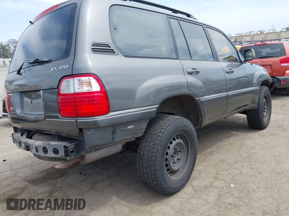 2001 Lexus LX 470 z VIN JTJHT00WX13509489, wystawiony jako IAAI lot #42227083 z przebiegiem 360 283 mil mil oraz . Historia ofert i sprzedaży dostępna na DreamBid. Obrazek 4.