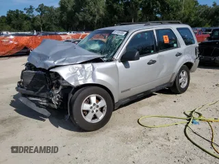 2008 Ford Escape XLS z VIN 1FMCU02Z08KA38515, wystawiony jako Copart lot #61155155 z przebiegiem Nie podano mil oraz Szkoda całkowita • Salvage title. Historia ofert i sprzedaży dostępna na DreamBid. Obrazek 1.