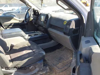 2019 Ford F-150 XL with VIN 1FTEW1E51KFC52807, listed as a IAAI auction lot 41383212 with 124,244 mi miles and . Bid and sale history available at DreamBid. Image 5.
