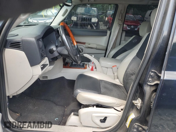 2007 Jeep Commander Overland z VIN 1J8HG68217C564894, wystawiony jako Copart lot #64382215 z przebiegiem 221 815 mil mil oraz Szkoda całkowita • Salvage title. Historia ofert i sprzedaży dostępna na DreamBid. Obrazek 7.