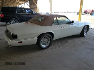 1994 Jaguar XJS with VIN SAJNX2743RC191142, listed as a Copart auction lot 78262994 with 70,111 mi miles and Salvage Title. Bid and sale history available at carsss.com. Image 3.