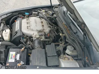 2004 Honda Accord EX with VIN 1HGCM82664A010907, listed as a IAAI auction lot 42457047 with 215,607 mi miles and . Bid and sale history available at DreamBid. Image 17.