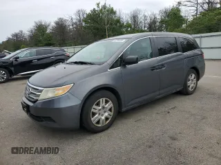 2011 Honda Odyssey LX with VIN 5FNRL5H22BB075577, listed as a Copart auction lot 62794495 with 87,459 mi miles and Clean title. Bid and sale history available at DreamBid. Image 1.