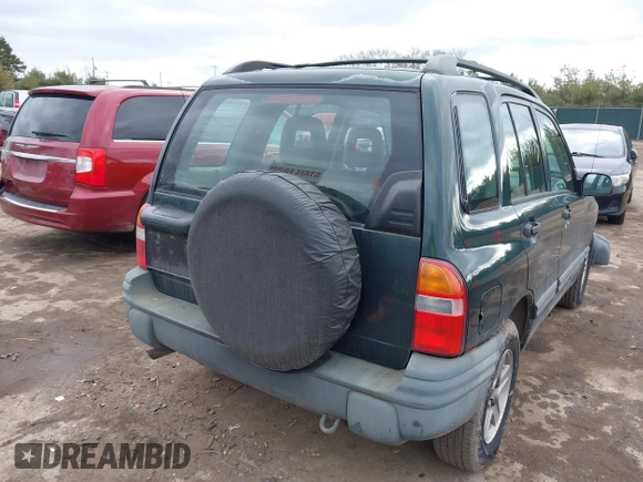 2002 Chevrolet Tracker z VIN 2CNBJ13C126946857, wystawiony jako IAAI lot #41491975 z przebiegiem Nie podano mil oraz . Historia ofert i sprzedaży dostępna na DreamBid. Obrazek 4.