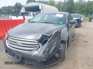 2018 Ford Taurus SEL with VIN 1FAHP2H8XJG135277, listed as a IAAI auction lot 42606524 with 27,103 mi miles and . Bid and sale history available at DreamBid. Image 6.
