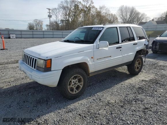 1996 Jeep Grand Cherokee Limited with VIN 1J4GZ78S2TY123592, listed as a Copart auction lot 84387624 with 0 miles and Salvage Title. Bid and sale history available at carsss.com. Image 1.
