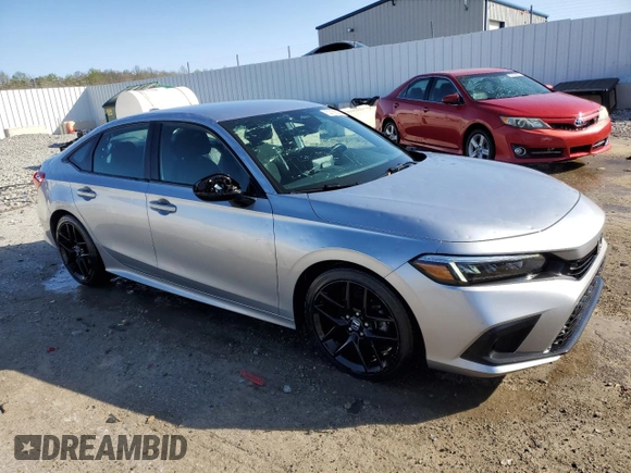 2022 Honda Civic Sport with VIN 2HGFE2F59NH563594, listed as a Copart auction lot 52135515 with 33,339 mi miles and Salvage Title. Bid and sale history available at carsss.com. Image 4.