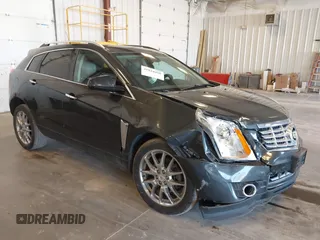 2014 Cadillac SRX Premium Collection z VIN 3GYFNGE38ES606731, wystawiony jako IAAI lot #41844450 z przebiegiem 156 541 mil mil oraz . Historia ofert i sprzedaży dostępna na DreamBid. Obrazek 1.