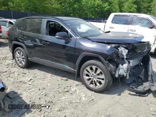 2021 Toyota RAV4 XLE Premium with VIN 2T3A1RFV3MC195877, listed as a Copart auction lot 55220955 with 92,679 mi miles and Salvage title. Bid and sale history available at DreamBid. Image 4.