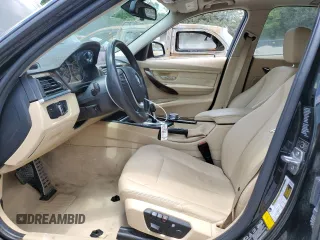 2015 BMW 3 Series 328i xDrive with VIN WBA3B5G58FNS15964, listed as a Copart auction lot 61783435 with 149,974 mi miles and Salvage title. Bid and sale history available at DreamBid. Image 7.