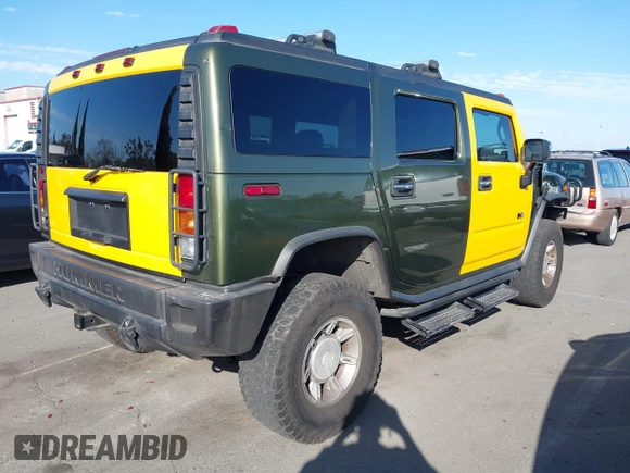 2003 Hummer H2 z VIN 5GRGN23UX3H124727, wystawiony jako IAAI lot #41697787 z przebiegiem 241 554 mil mil oraz . Historia ofert i sprzedaży dostępna na DreamBid. Obrazek 4.