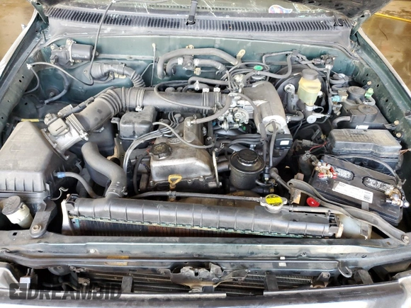 1999 Toyota Tacoma with VIN 4TAPM62N9XZ555738, listed as a Copart auction lot 78293634 with 210,096 mi miles and Salvage Title. Bid and sale history available at DreamBid. Image 11.