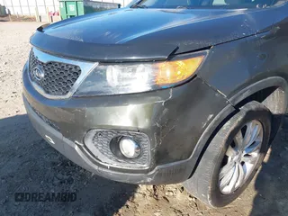 2011 Kia Sorento EX with VIN 5XYKUDA25BG093924, listed as a IAAI auction lot 41648802 with 221,355 mi miles. Bid and sale history available at carsss.com. Image 6.