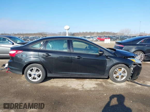 2013 Ford Focus SE with VIN 1FADP3F28DL260843, listed as a IAAI auction lot 41889090 with 131,636 mi miles. Bid and sale history available at carsss.com. Image 14.