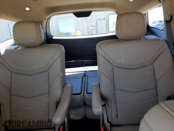 2024 Cadillac XT6 Premium Luxury z VIN 1GYKPERS1RZ755490, wystawiony jako Copart lot #49706575 z przebiegiem 4 239 mil mil oraz Szkoda całkowita • Salvage title. Historia ofert i sprzedaży dostępna na DreamBid. Obrazek 10.