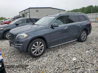 2014 Mercedes-Benz GL 450 z VIN 4JGDF7CE2EA402907, wystawiony jako Copart lot #58752865 z przebiegiem 80 482 mil mil oraz Tytuł czysty. Historia ofert i sprzedaży dostępna na DreamBid. Obrazek 1.