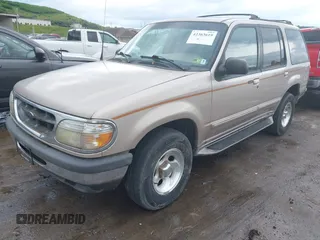 1998 Ford Explorer XL z VIN 1FMZU34E5WZA20652, wystawiony jako IAAI lot #42363619 z przebiegiem 383 213 mil mil oraz . Historia ofert i sprzedaży dostępna na DreamBid. Obrazek 2.