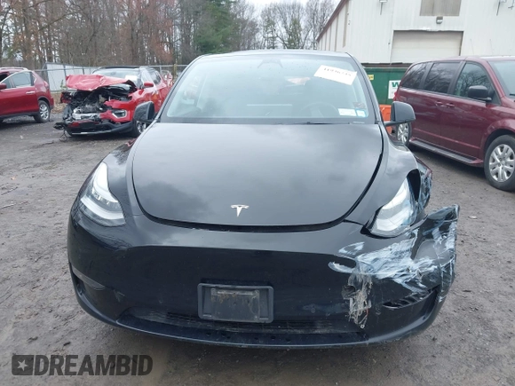 2022 Tesla Model Y Long Range with VIN 7SAYGDEE5NA016892, listed as a IAAI auction lot 41936735 with 69,136 mi miles and . Bid and sale history available at DreamBid. Image 12.