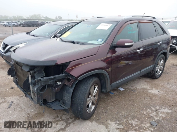 2012 Kia Sorento EX z VIN 5XYKU3A63CG306285, wystawiony jako IAAI lot #42166617 z przebiegiem 215 132 mil mil oraz . Historia ofert i sprzedaży dostępna na DreamBid. Obrazek 2.