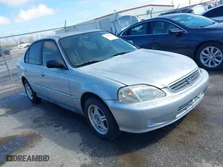 1999 Honda Civic VP with VIN 2HGEJ6615XH528453, listed as a IAAI auction lot 41655363 with 163,816 mi miles. Bid and sale history available at carsss.com. Image 1.