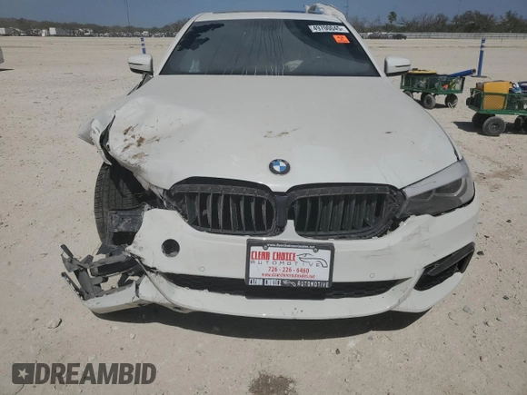 2018 BMW 5 Series 530i z VIN WBAJA5C54JWA57368, wystawiony jako Copart lot #49700045 z przebiegiem Nie podano mil oraz Szkody całkowita. Historia ofert i sprzedaży dostępna na DreamBid. Obrazek 5.