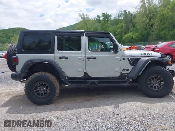 2023 Jeep Wrangler Sport S с VIN 1C4HJXDN0PW511682, выставлен на аукционе IAAI как лот 42199890 с пробегом 29 061 миль миль и . История ставок и продаж доступна на DreamBid. Изображение 13.