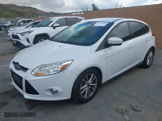 2012 Ford Focus SE with VIN 1FAHP3K24CL379060, listed as a IAAI auction lot 41955080 with 149,018 mi miles. Bid and sale history available at carsss.com. Image 2.