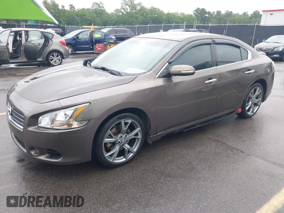 2014 Nissan Maxima S z VIN 1N4AA5AP2EC455230, wystawiony jako IAAI lot #42413381 z przebiegiem 182 766 mil mil oraz . Historia ofert i sprzedaży dostępna na DreamBid. Obrazek 17.
