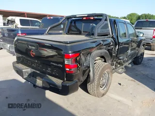 2022 Nissan Frontier S with VIN 1N6ED1EK2NN677116, listed as a IAAI auction lot 42017620 with 14,653 mi miles. Bid and sale history available at carsss.com. Image 4.