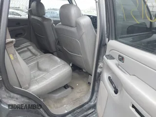 2004 GMC Yukon SLT with VIN 1GKEK13Z24J113954, listed as a IAAI auction lot 41950157 with 174,021 mi miles. Bid and sale history available at carsss.com. Image 8.