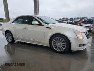 2012 Cadillac CTS Performance with VIN 1G6DJ5E31C0102123, listed as a Copart auction lot 89283265 with 133,962 mi miles and Salvage Title. Bid and sale history available at DreamBid. Image 4.