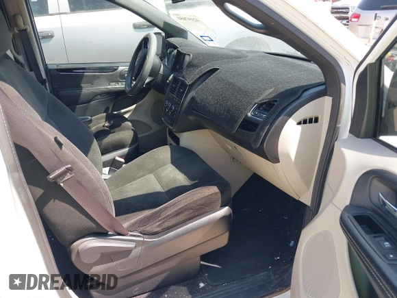 2015 Dodge Grand Caravan SE with VIN 2C4RDGBG9FR691462, listed as a IAAI auction lot 42197050 with 124,239 mi miles and . Bid and sale history available at DreamBid. Image 5.