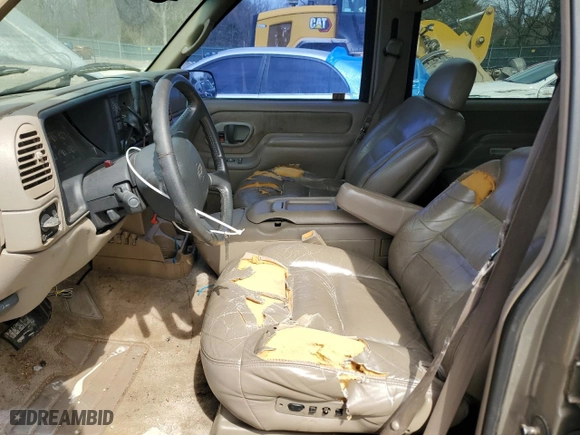 1999 Chevrolet Tahoe with VIN 1GNEC13RXXJ481481, listed as a Copart auction lot 50137645 with 233,418 mi miles and Salvage Title. Bid and sale history available at carsss.com. Image 7.