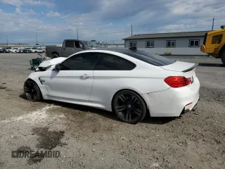 2015 BMW M4 z VIN WBS3R9C50FK334663, wystawiony jako Copart lot #59012605 z przebiegiem 69 749 mil mil oraz Szkoda całkowita • Salvage title. Historia ofert i sprzedaży dostępna na DreamBid. Obrazek 2.