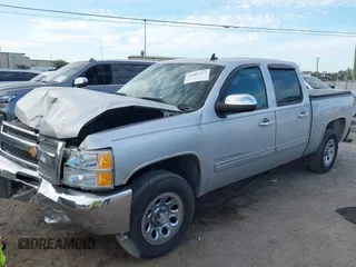 2013 Chevrolet Silverado 1500 LT with VIN 3GCPCSEA4DG234422, listed as a IAAI auction lot 41907573 with 95,696 mi miles and . Bid and sale history available at DreamBid. Image 2.