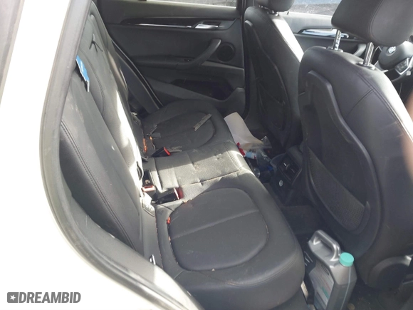2018 BMW X1 sDrive28i with VIN WBXHU7C32J5H41587, listed as a IAAI auction lot 41538394 with 125,804 mi miles. Bid and sale history available at carsss.com. Image 8.