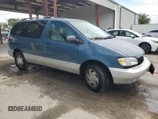 2000 Toyota Sienna LE with VIN 4T3ZF13C1YU267463, listed as a Copart auction lot 71667624 with 0 mi miles and Salvage Title. Bid and sale history available at carsss.com. Image 4.
